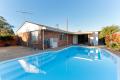 Family home with swimming pool.