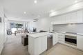 Urban Luxury with a Leafy Twist – Double-Storey Apartment in Resort-Style Complex