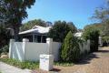PEACEFUL SETTING ONLY MINUTES FROM BEACH.