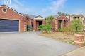 Located in a quiet, family-friendly court, the home offers a peaceful atmosphere while being close to a range of amenities and prime location,