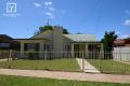 Central Weatherboard Home – Walk to Everything!