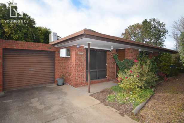 SPACIOUS TWO BEDROOM UNIT LOCATED IN A LOVELY AREA